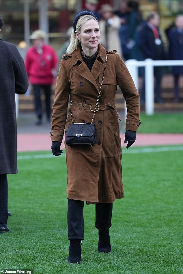 The king's niece, 43, looked effortlessly chic in the brown jacket, which featured a gold-buckled belt and buttons down the sides.