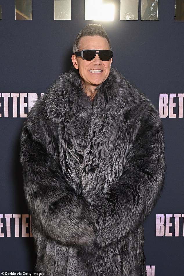 The singer, 50, turned heads as he bundled up in the fluffy, eye-catching ensemble, which resembles his animal alter ego in the film.