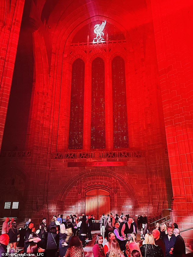 Liverpool Cathedral dressed in club colors for end-of-year staff function