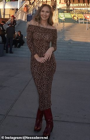 Tessa showed off an off-the-shoulder leopard print dress paired with boots for a western touch.