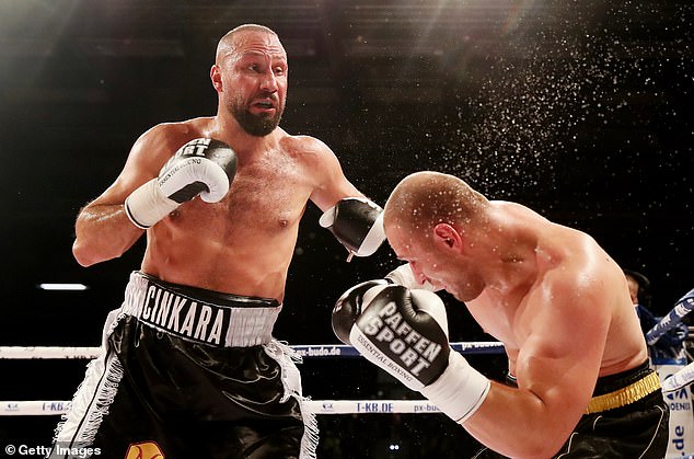 German star Huseyin Cinkara (left) has broken his ankle and has been ruled out of the fight.