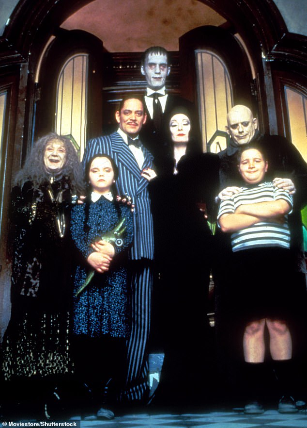 That's right, it's Carel Struycken (center)! He starred as Lurch in the 1991 film The Addams Family; (From left to right) Judith Malina, Christina Ricci, Raúl Julia, Struycken, Anjelica Huston, Christopher Lloyd and Jimmy Workman seen in a photograph