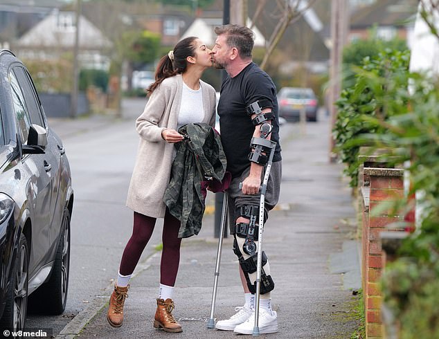 The couple shared a kiss as Nick headed to Katie's 4x4 so she could take him home after her recent operation.