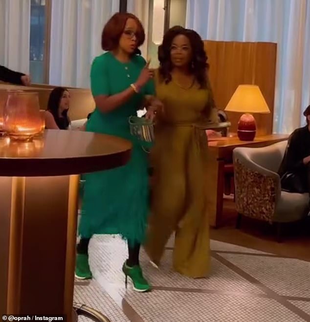 In a video Oprah shared on Instagram early Saturday afternoon, King can be seen wearing a teal maxi dress with three-quarter sleeves as she walked alongside and chatted with the legendary talk show host — blissfully unaware of the group of famous faces right in front of her. her