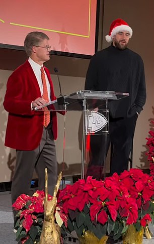 Travis Kelce appeared on stage at the Kansas City Chiefs Christmas party on Friday night.