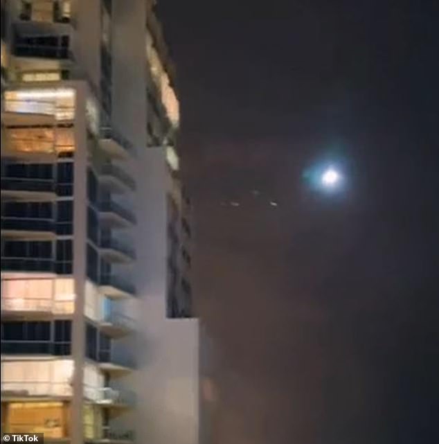 A New Jersey real estate agent shared a shocking video: a bright dot floating through the sky toward a luxury apartment building on South Beach