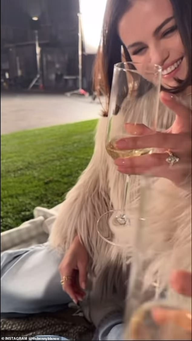 He filmed the actress during the romantic picnic as they celebrated glasses of champagne moments after he had popped the big question.