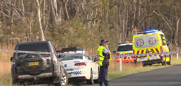 Police appear at the scene of the accident on Saturday.