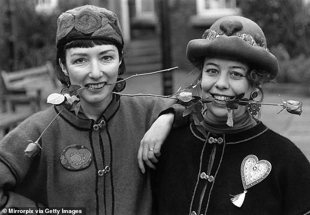 Pontin's bluecoats, Anne Crabtree and Maureen Brampton, with roses to give to guests on Valentine's Day, 1991.