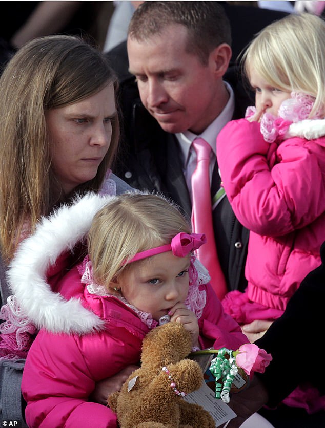 The Parker family attends Emilie's funeral on December 22, 2012