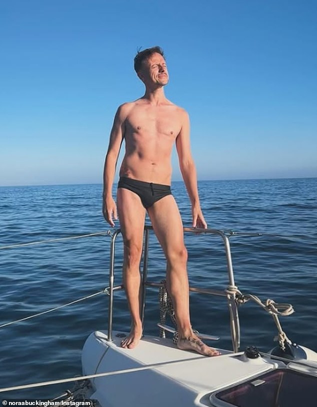 Kevin, seen here standing on a boat wearing a pair of tiny Speedos, now works as a fitness trainer.