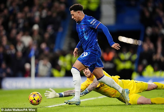 Jadon Sancho rounded the goalkeeper but couldn't get his shot into the empty net.