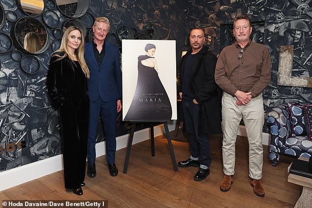 The star appeared in high spirits as she posed for photos with Guy Hendrix Dyas, Massimo Cantini Parrini and Steven Knight.