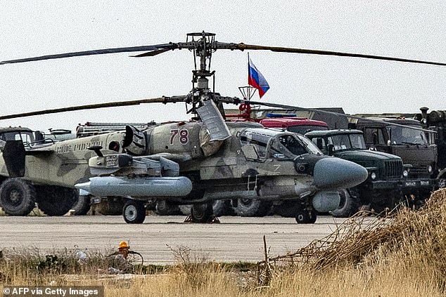 A Russian Air Force military attack helicopter at the Russian air base at Qamishli airport in northeastern Syria.