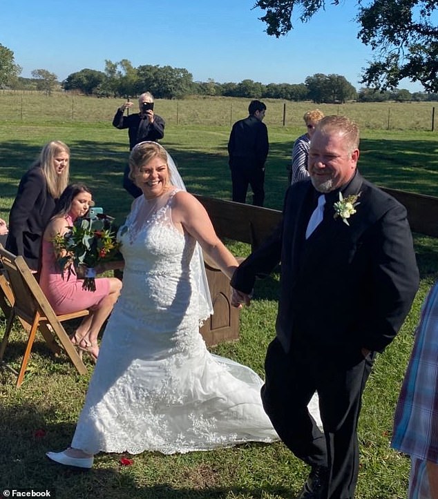 Michelle Means of Willis, Texas, appears with her husband Darrin Means in one of her online photos.