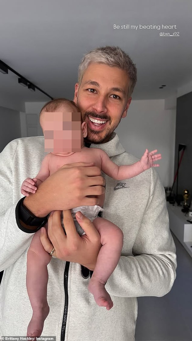 Benjamin held a little baby in the adorable image and also sported a very different hairstyle. With natural brown hair, it seems that the Swiss athlete has dyed his hair smoky gray.