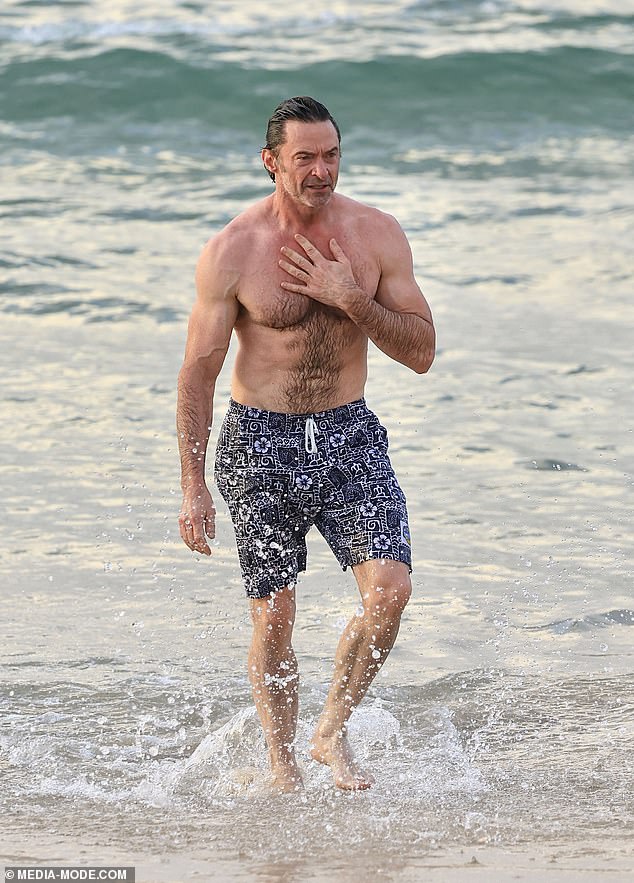 The actor, 56, didn't look too far removed from his famous mutant character Wolverine as he showed off his abs and muscular physique.