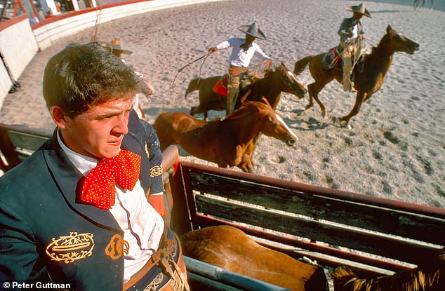 As part of the annual Fiesta de San Antonio, the city's Charra Association, the largest and oldest of its kind on this side of the Rio Grande, presents the celebration of A Day in Ancient Mexico. Elegantly dressed in a gentleman's jacket and dress, this seated charro contemplates his upcoming dangerous Paso de la Muerte event.