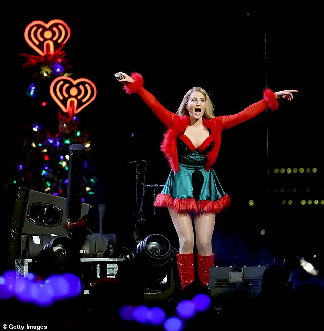 On Sunday, the Made You Look hitmaker, 30, dressed in a sexy elf look as she vocalized some of her biggest hits on the star-studded festive concert tour.