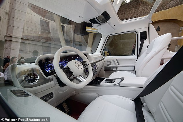 The pearl-white popemobile is powered by an electric motor that the Pope 