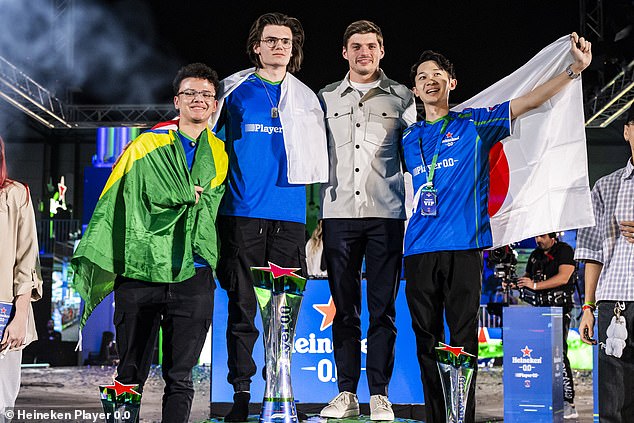 Verstappen pictured (second from right) posing for a photo with the finalists in Madrid.