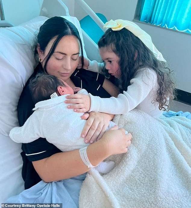 One-day-old baby Milana-Mae with her mother Brittany and older sister Malayisa-Maree