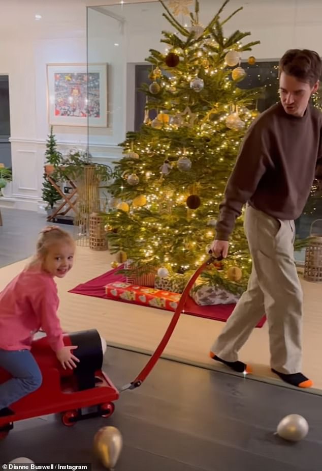 Meanwhile, her boyfriend Joe Sugg was seen taking his niece Zofia on a toy train.