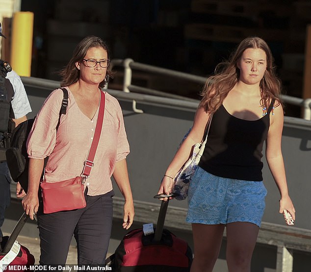 Georgia Sandoe-Simpson, 19, and her mother Tanya Sandoe, 56, are pictured returning to Sydney on Monday.