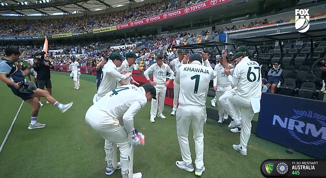 The Australian players crouched down and raised their hands above their heads after a call was issued.