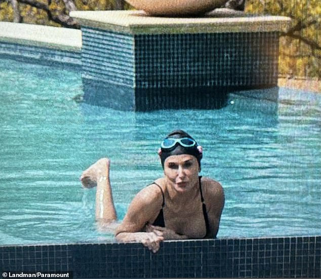 Moore made waves as she modeled a black swimsuit while in the pool at her Texas mega-mansion.