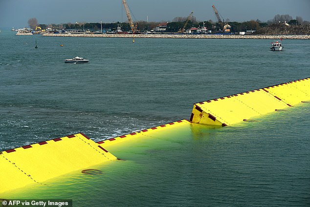 Some experts say the island's more permanent status is due to the MOSE flood barrier (pictured) separating Venice from the Adriatic. This barrier can speed up the current to bring in more sand while it is open and protect the island from winter storm surges when it is closed.