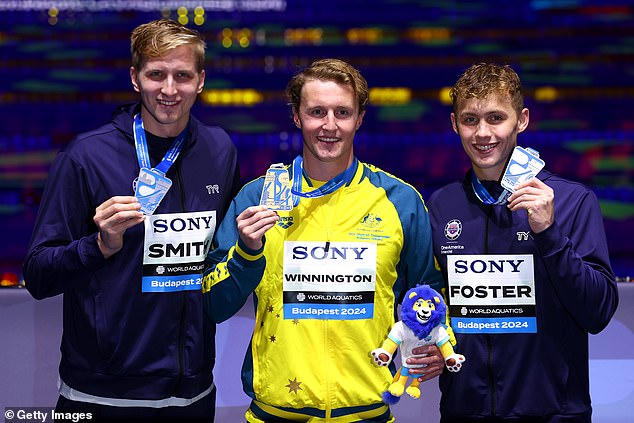 Elijah Winnington, center, won one of two gold medals the Australians won at the championships.