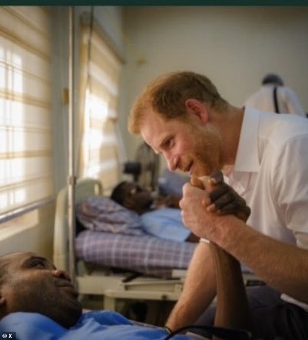 Prince Harry during a visit to the wards of the Nigerian military hospital Kadun