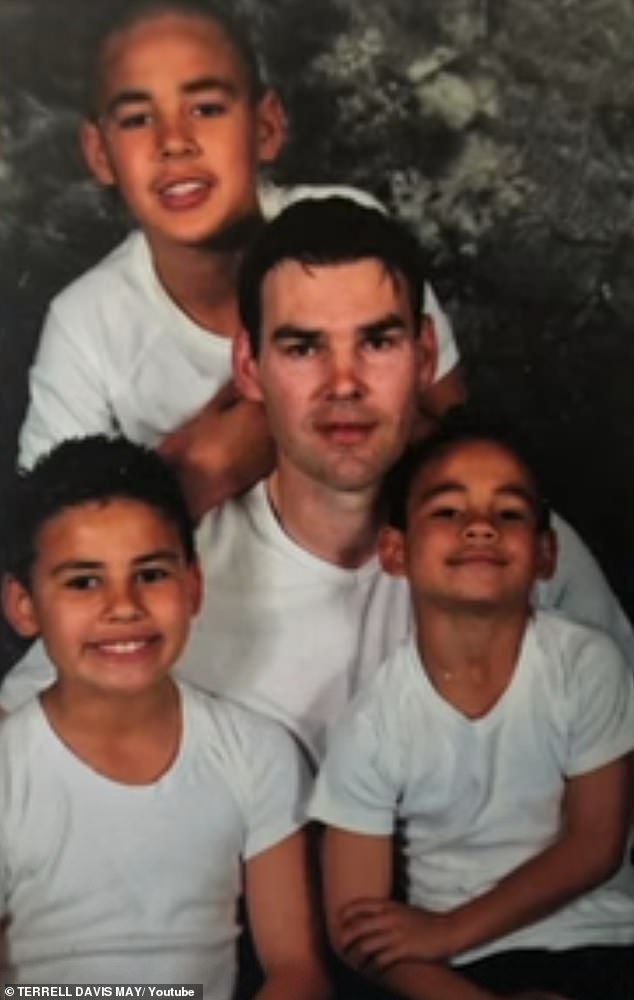 Jay with his children Tyrone, Terrell and Taylan, who grew up in a low-income suburb.