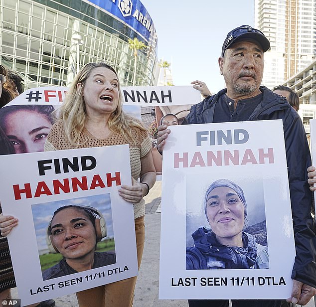 Ryan Kobayashi holds a photo of his missing daughter Hannah outside Crypto.com Arena with his aunt Larie Pidgeon.