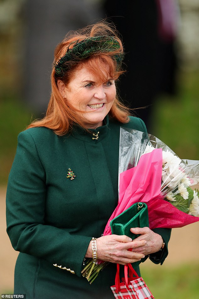 Fergie held a bouquet of flowers while wearing a dark brown dress, paired with a festive Christmas tree brooch and a large bracelet with her daughter's name 'Eugenie' on it.