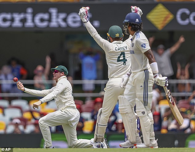 Smith was elated after dropping the batsman on the first ball of day four in Brisbane during the third Test (pictured, celebrating the wicket)