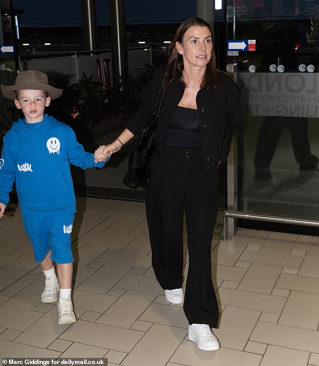 The football director, 39, was not at Manchester Airport to greet his wife when she landed with their two youngest children, Kit, eight, and Cass, six, on December 11.