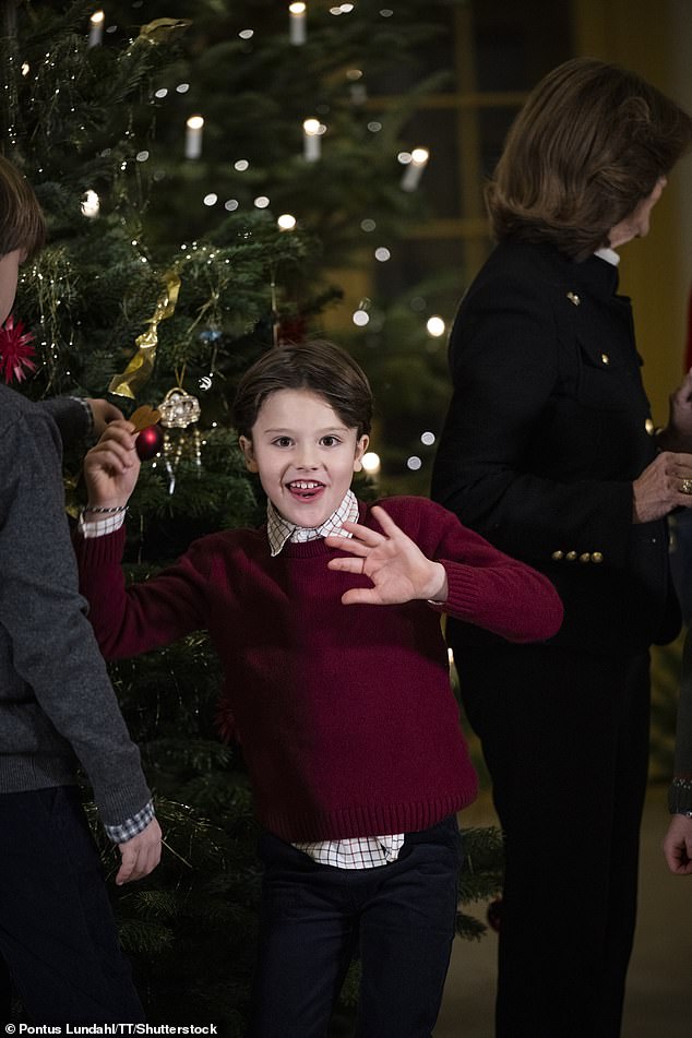 Prince Alexander, son of Prince Carl Philip and Princess Sofia, looked in high spirits as he gave the camera a cheeky smile and waved.