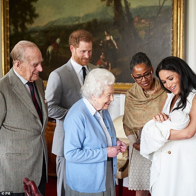 The late Queen and Prince Philip meet their great-grandson Archie in June 2019