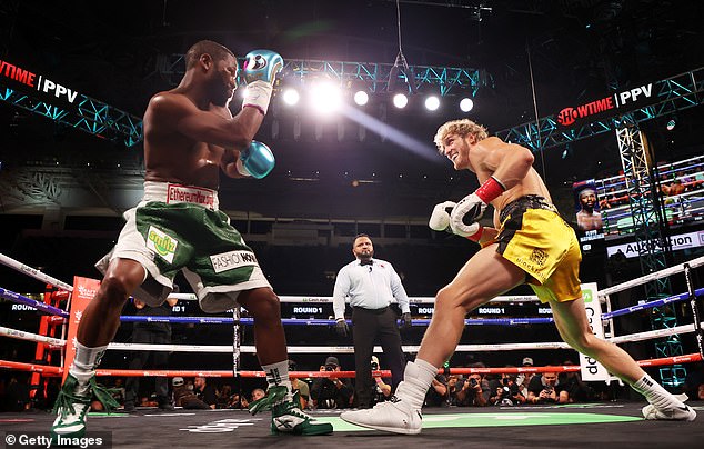 Logan Paul fought Floy Mayweather (left) in an unscored exhibition bout in 2021