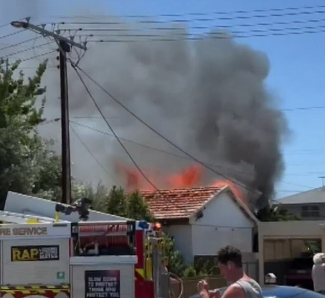 The woman was sleeping indoors when smoke started coming out of her Adelaide home.