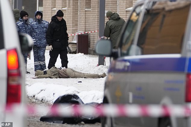 Investigators work at the scene of Lieutenant General Igor Kirillov, who was killed by an explosive device placed near a residential apartment block in Moscow, Russia, on December 17, 2024.