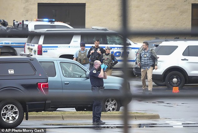 Police investigate as emergency vehicles parked outside Abundant Life Christian School in Madison, Wisconsin, on Monday