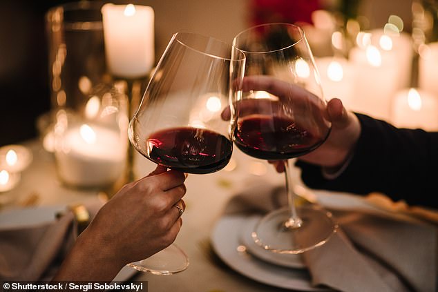 Researchers at the University of Barcelona found that those who drank between 12 and 35 glasses of wine a month had a 50 percent lower risk than those who drank no more than one.