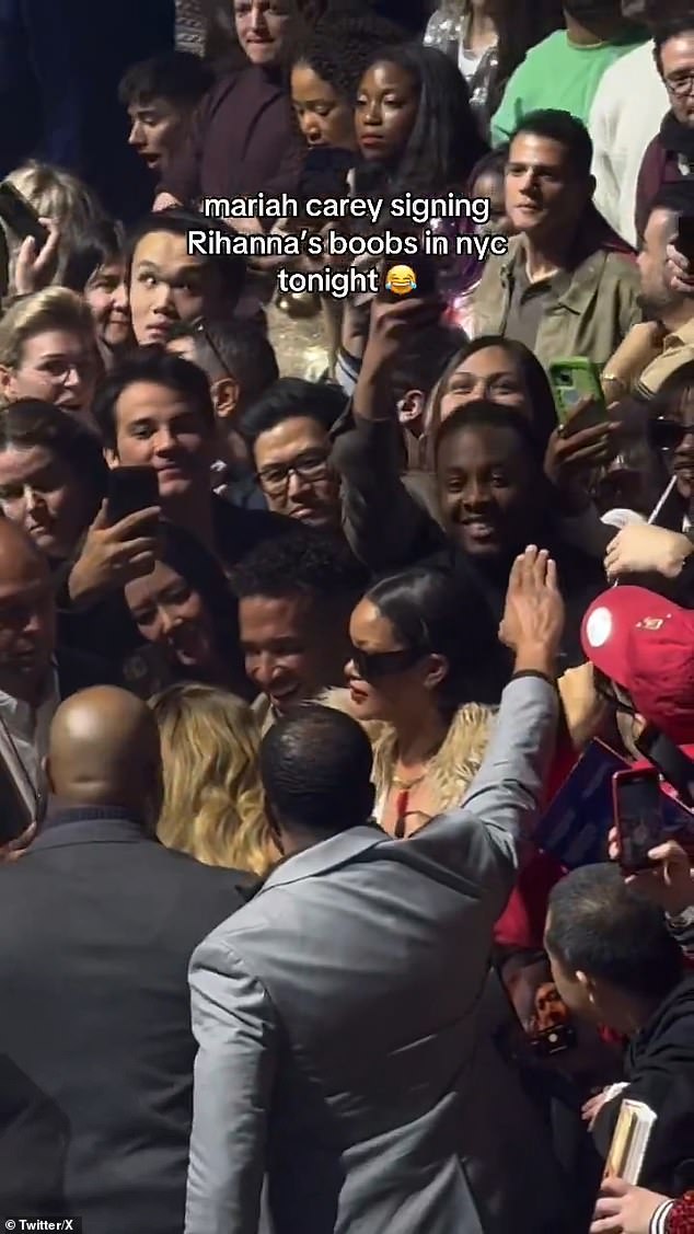 An excited Rihanna grabbed a microphone and told the crowd: 'Mariah Carey is signing my t*t, y'all. This shit is fucking epic.