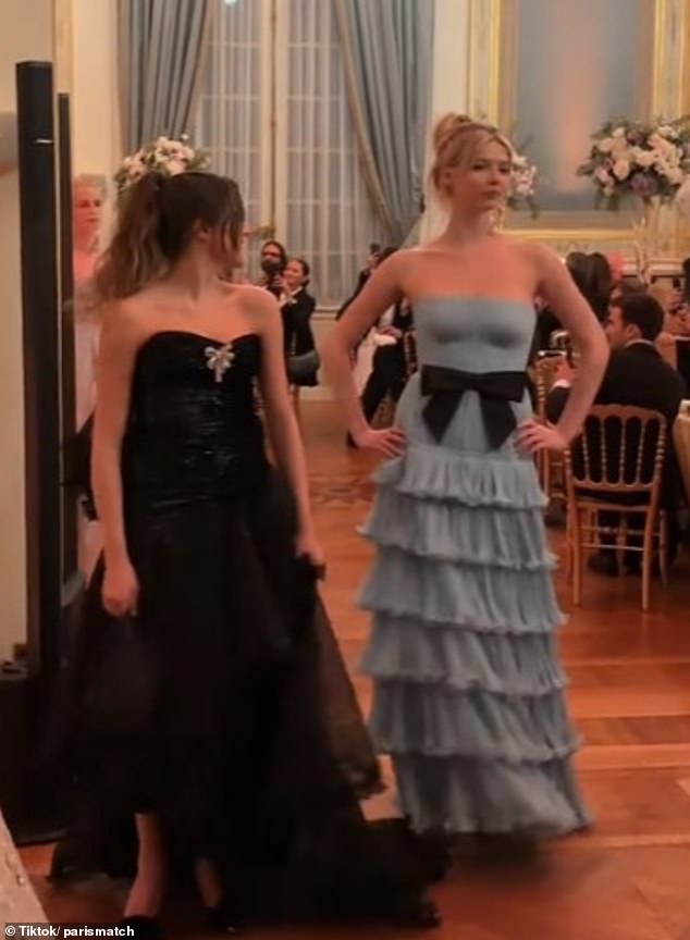 Apple was seen sabotaging another girl's photo opportunity at a debutante ball in Paris, France.