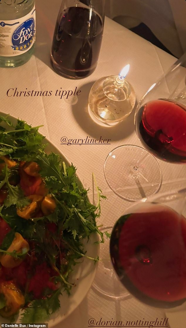 Showing off her table set with salad and wine, the Welsh actress tagged Gary and wrote 'Christmas tipple'.