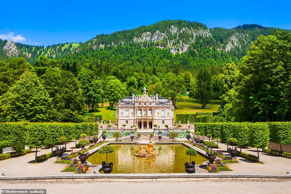 The Versailles-inspired Schloss Linderhof was Ludwig II's smallest palace and was used by the monarch as a private retreat. Lonely Planet reveals: 'Completed in 1878, the palace hugs a steep hillside in a fantasy landscape of French gardens, fountains and follies'