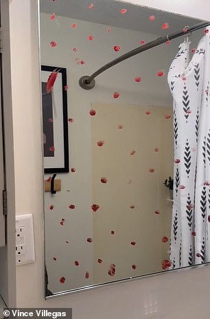 Red dots were left on the bathroom mirror in the one-bedroom rental property in Saugatuck, Michigan, later found to have been drawn with lipstick, police confirmed